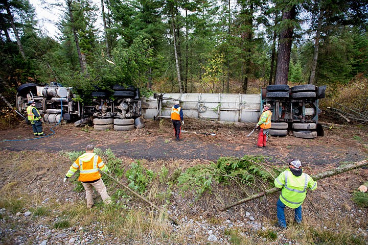 &lt;p&gt;Crews with the Idaho Transportation Department remove tree limbs from an overturned tanker truck full of raw sewage on Wednesday, Oct. 5, 2016 on the northbound, right-hand shoulder of Highway 95, just north of Lancaster Road. The 53-year-old driver drifted off the road while driving northbound around 9:15 a.m. The driver died on scene. The cause of the crash is under investigation.&lt;/p&gt;