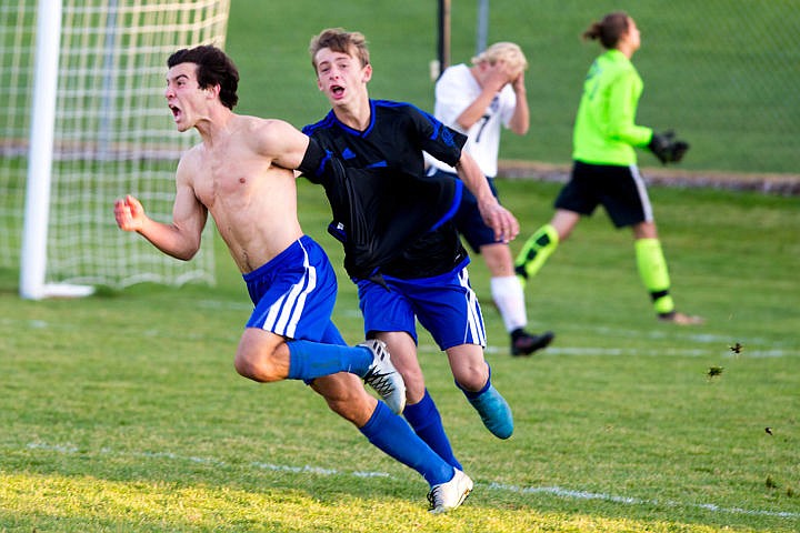 &lt;p&gt;Coeur d'Alene senior Austin Garitone celebrates shirtless after scoring the game-winning goal to end the double-overtime 5A Region 1 championship game against Lake City on Wednesday, Oct. 12, 2016 at Lake City High School. The Vikings will advance to state playoffs on the 20th at Post Falls High School.&lt;/p&gt;