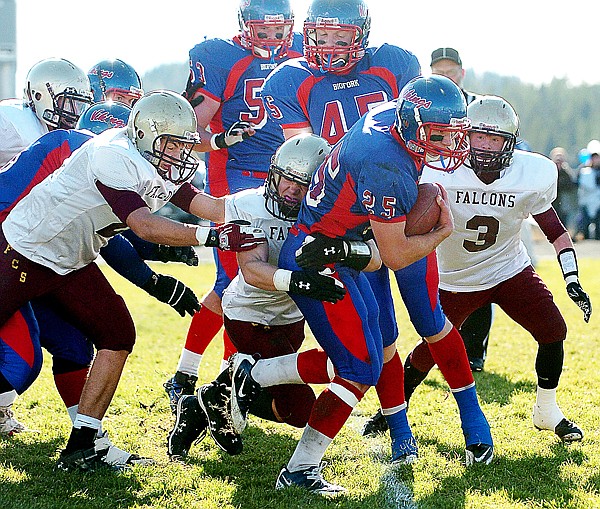 &lt;p&gt;Bigfork's Cody Dopps keeps moving through a pack of Florence
defenders during the first quarter of Saturday's first-round
playoff game between the Falcons and the Vikings. Dopps scored four
touchdowns for the Vikings, helping the defending state champions
to a 35-26 victory.&lt;/p&gt;