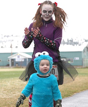 &lt;p&gt;At right, two-year-old Cookie Monster, Keaghan Dickson, and his mother, Jess Dickson, circle the track at Linderman Elementary School.&lt;/p&gt;