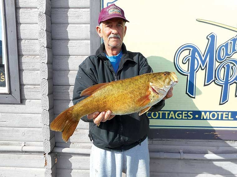 Charlie Lunn of Ellensburg was having a relaxing day of dock fishing on MarDon Resort. He was targeting Perch with a size 6 bait hook at a night-crawler when his pole doubled over with a 5 lb 9 oz jumbo smallmouth bass.