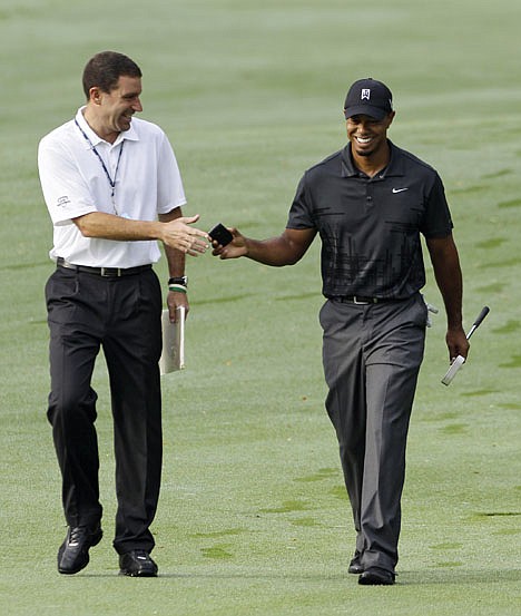 &lt;p&gt;MARK DUNCAN/Associated Press Tiger Woods' agent Mark Steinberg, left, left IMG, where he was the head of the powerful golf division and a major player when it came to creating new tournaments around the world and finding a spot for them on the schedule.&lt;/p&gt;