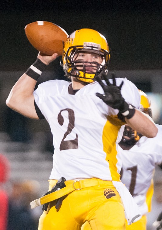 <p>Patrick Cote/Daily Inter Lake Helena Capital's senior running back Gunnar Brekke throws the ball Friday night during Glacier's playoff victory over Helena Capital at Legends Stadium. Friday, Nov. 2, 2012 in Kalispell, Montana.</p>