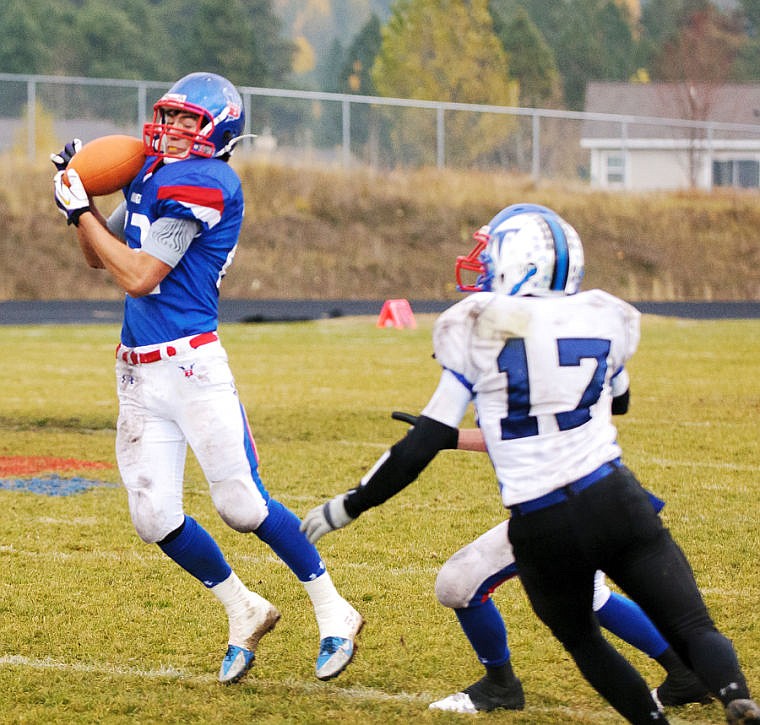 &lt;p&gt;Bigfork defensive back Jonathan Landon (left) intercepts a pass late in the fourth quarter of Saturday&#146;s Class B playoff football game with Townsend. Landon returned the interception for a touchdown.&lt;/p&gt;