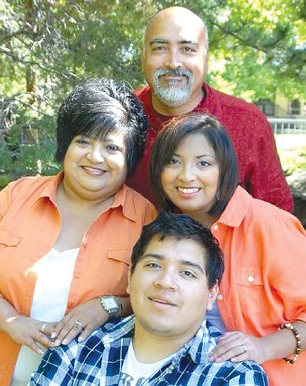 Wahluke School Board candidate Cynthia de Victoria with husband
Arthur de Victoria and their children Arthur Warren and Rebekah,
both graduates of the Wahluke school system.