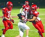 Huskies win handily, nab second seed to state