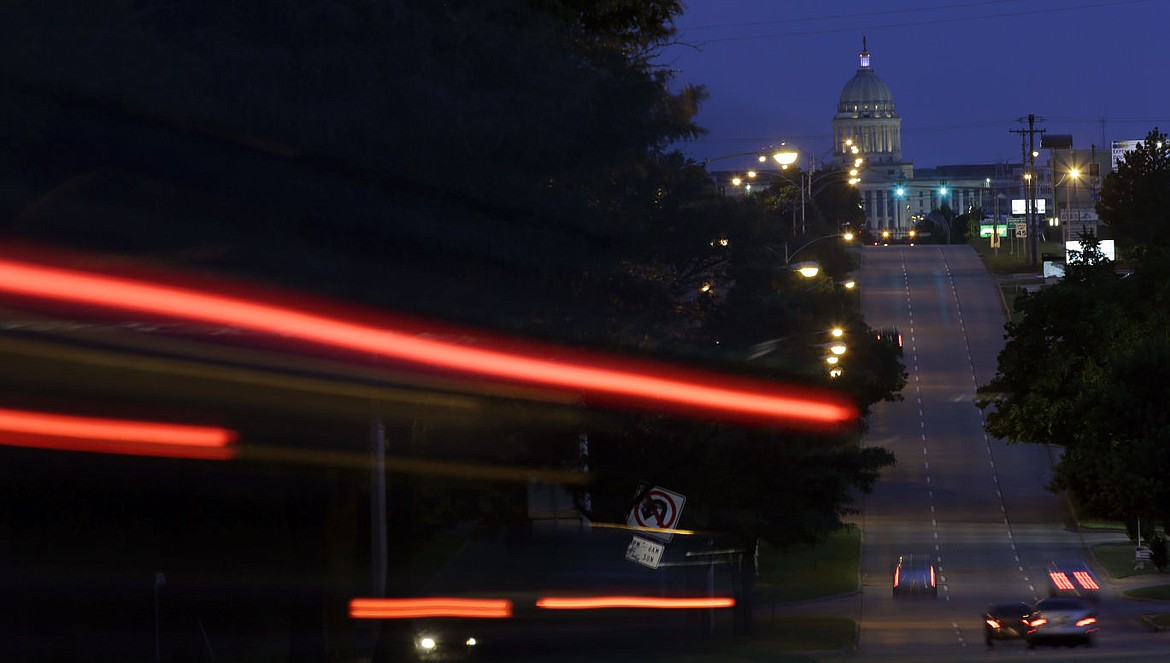 &lt;p&gt;ADVANCE FOR USE ON SUNDAY NOV. 1 - In a timed exposure photo, cars travel along Lincoln Boulevard in Oklahoma City on Wednesday, June 10, 2015, near the site where a woman says she was sexually assaulted by Oklahoma City police officer Daniel Holtzclaw. Holtzclaw is accused of sexually assaulting 13 women he encountered while on patrol in neighborhoods near the state Capitol. (AP Photo/Eric Gay)&lt;/p&gt;