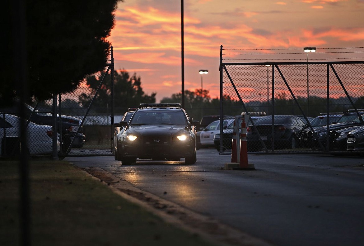 &lt;p&gt;ADVANCE FOR USE ON SUNDAY NOV. 1 - Police cars drive out of the Springlake Police Station in Oklahoma City at shift change on Oct. 7, 2015. Former Oklahoma City police officer Daniel Holtzclaw, who worked in the department's Springlake Division, is accused of sexual offenses against 13 women he encountered while on patrol. A yearlong Associated Press investigation illuminated the problem of rape and sexual misconduct committed by law officers in the United States, uncovering about 1,000 officers who lost their licenses from 2009 to 2014 for such incidents. (AP Photo/Sue Ogrocki)&lt;/p&gt;