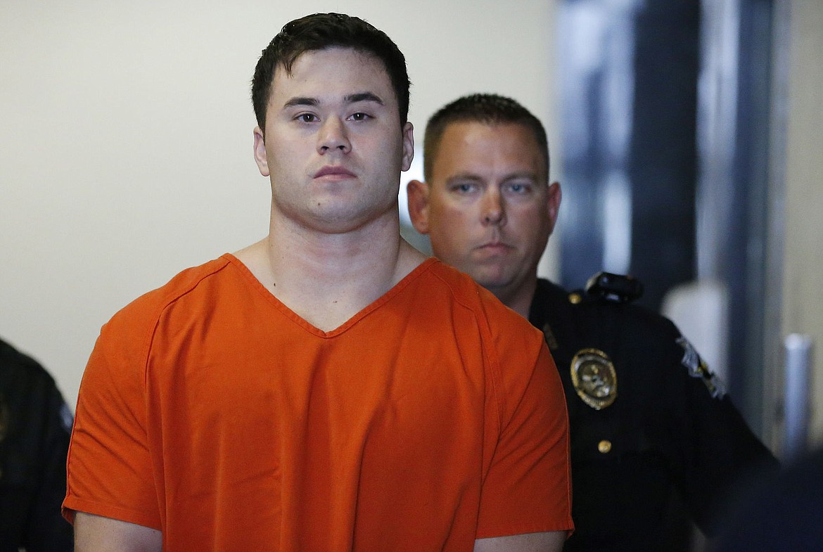 &lt;p&gt;ADVANCE FOR USE ON SUNDAY NOV. 1 - FILE - In this Sept. 3, 2014 file photo, Daniel Holtzclaw, front, a former Oklahoma City police officer accused of sexual offenses against 13 women he encountered while on patrol, is led into a courtroom for a hearing in Oklahoma City. Holtzclaw's trial is set to begin on Monday, Nov. 2. (AP Photo/Sue Ogrocki, File)&lt;/p&gt;