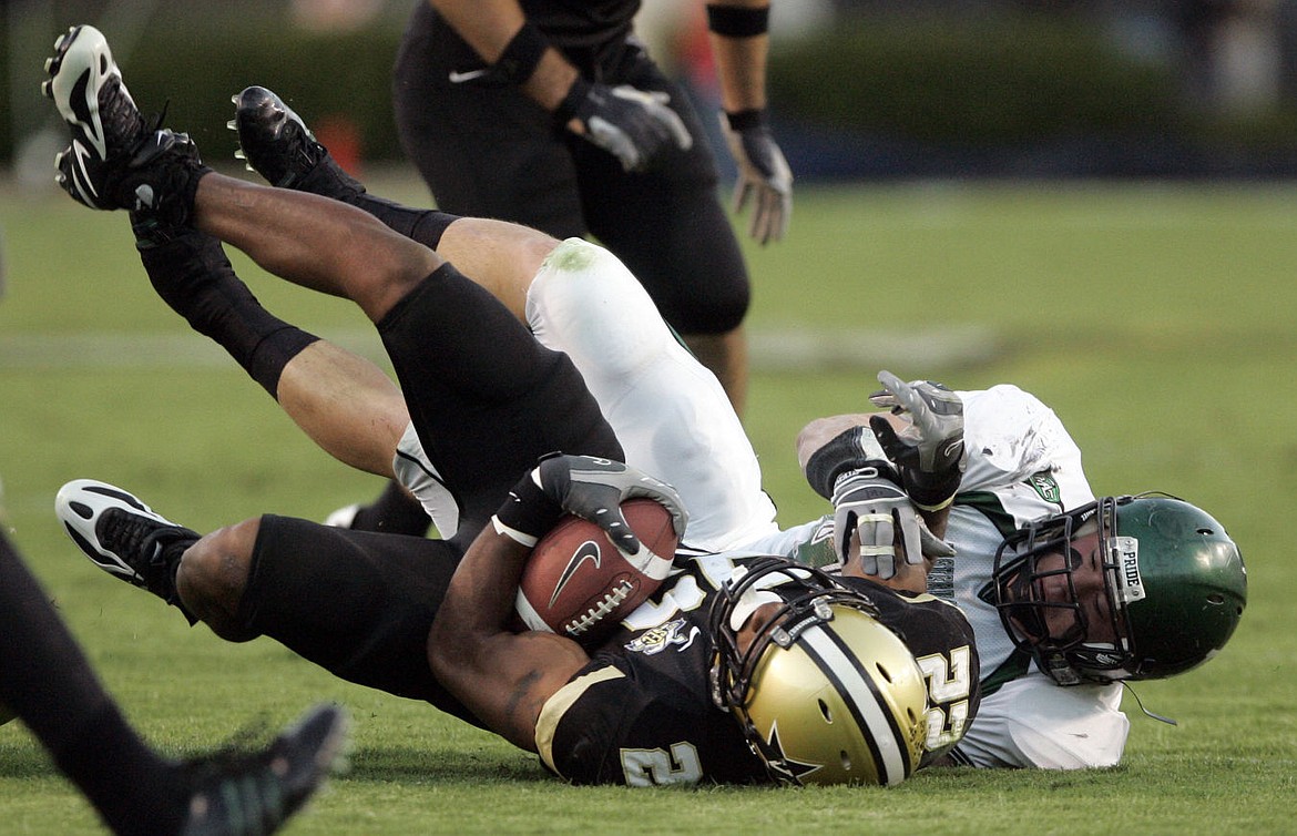 &lt;p&gt;ADVANCE FOR USE ON SUNDAY NOV. 1 - FILE - In this Sept. 29, 2007 file photo, Eastern Michigan linebacker Daniel Holtzclaw, right, brings down Vanderbilt tailback Cassen Jackson-Garrison (22) in the first quarter of a college football game in Nashville, Tenn. Holtzclaw, who went on to become an Oklahoma City police officer, is accused of sexual offenses against 13 women he encountered while on patrol. A yearlong Associated Press investigation illuminated the problem of rape and sexual misconduct committed by law officers in the United States, uncovering about 1,000 officers who lost their licenses from 2009 to 2014 for such incidents. (AP Photo/Mark Humphrey, File)&lt;/p&gt;