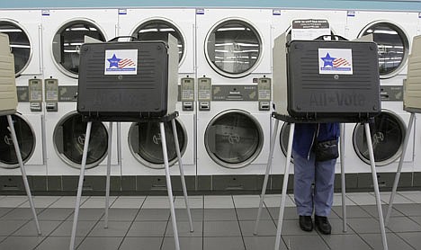 &lt;p&gt;FILE - In this Nov. 4, 2008 file photo, a lone voter casts her ballot at the Su Nueva Launderia on the southwest side of Chicago. Lots of people complain about the shortcomings of the country?s two-party system for picking a president. Now a nonpartisan group is gathering millions of petition signatures _ and dollars _ to offer people a Plan B. Americans Elect, which grew out of a failed 2008 effort to provide a nonpartisan alternative in the presidential race, aims to secure a slot on the November ballot in all 50 states for a to-be-determined candidate who would be nominated in the nation?s first online convention next summer. (AP Photo/Charles Rex Arbogast, File)&lt;/p&gt;