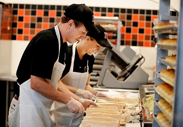 &lt;p&gt;Ryan and Julie Patzer, owner/operators of the new Jimmy Johns work rapidly to complete their largest order to date, 120 sandwiches with an hour and 20 minutes notice, on Wednesday morning, October 31, in Kalispell.&lt;/p&gt;