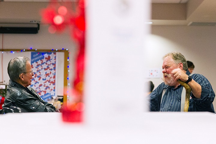 &lt;p&gt;SHAWN GUST/Press Jack Christiansen, cadastral mapping specialist with Kootenai County, right, visits with former county employee Bob Holland Monday during the 12th Annual Soup and Bread Contest in Coeur d'Alene. The event, hosted by the Kootenai County Assessors' Office, raises funds that go to fill Christmas boxes with food and gifts for disabled or widowed senior citizens in need.&lt;/p&gt;