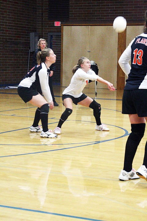 Libero Kelsey Beagley keeps one alive for the Trotters against Bigfork on Friday afternoon.