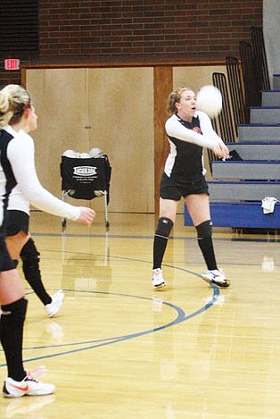 Ashley Thompson bumps the ball to a teammate during the tournament versus Troy.