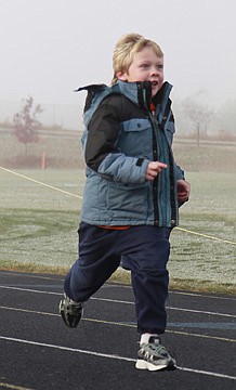 &lt;p&gt;Six-year-old Carter Smith is the first of Ms. Billedeux's kindergarten class to cross the finish line on Friday morning.&lt;/p&gt;