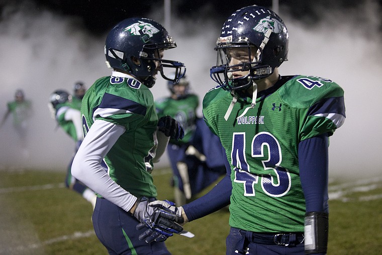 &lt;p&gt;Glacier's Rial Gunlikson (43) and James Cutler (80) slap hands
before the start of the second half during Glacier's playoff
victory over Billings Senior Friday night at Legends Stadium.&lt;/p&gt;