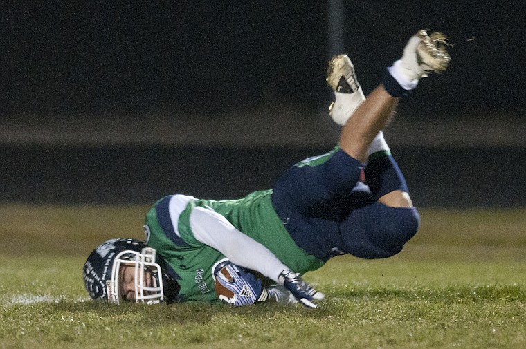 &lt;p&gt;Glacier's junior wide receiver Kyle Griffith (3) hits the ground
hard after being tripped on a long reception during Glacier's
playoff victory over Billings Senior Friday night at Legends
Stadium.&lt;/p&gt;