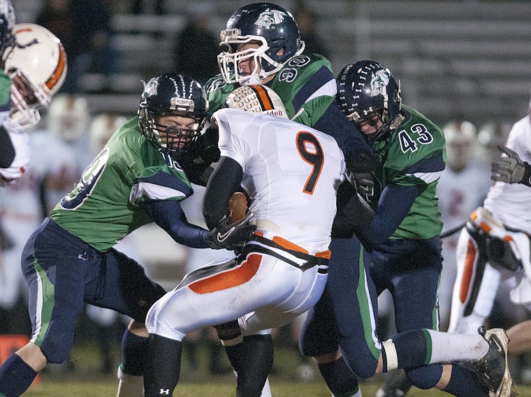 &lt;p&gt;Patrick Cote/Daily Inter Lake Glacier's Dawson Day (19), Devin
Jeffries (90) and Rial Gunlikson (43) take down Bronco's running
back Nolan Saraceni during Glacier's playoff victory over Billings
Senior Friday night at Legends Stadium.&lt;/p&gt;