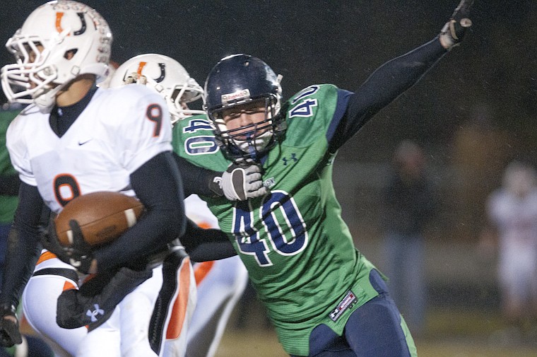 &lt;p&gt;Glacier's Austin Foucher (40) tries to get around a defender
during Glacier's playoff victory over Billings Senior Friday night
at Legends Stadium.&lt;/p&gt;