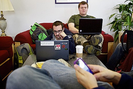 &lt;p&gt;Ean Kimbrell, 20, left, and C.J. Sobkowiak, 23, use their laptops in the student union building while on a break between classes Thursday at North Idaho College.&lt;/p&gt;