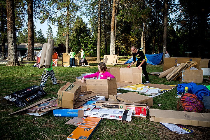 &lt;p&gt;TESS FREEMAN/Press&lt;/p&gt;&lt;p&gt;Bella Mismer, 10, and her dad Josh Mismer build their cardboard house to sleep in at the beginning of the Cardboard Box City event on Friday night at Fernan Elementary School. Participants raise over $100 from friends and family and then spend the night in cardboard boxes to raise awareness for homelessness and raise money for Family Promise in Coeur d&#146;Alene. Family Promise provides services to help homeless families with children to find sustainable housing.&lt;/p&gt;