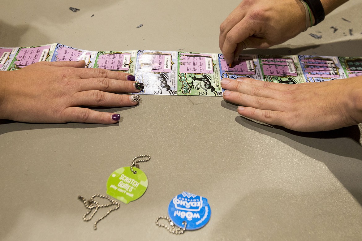 &lt;p&gt;North Idaho teachers scratch as many tickets as they can to win cash for their classroom and schools during Idaho Lottery's Scratch for Schools event Wednesday night at North Idaho College.&lt;/p&gt;