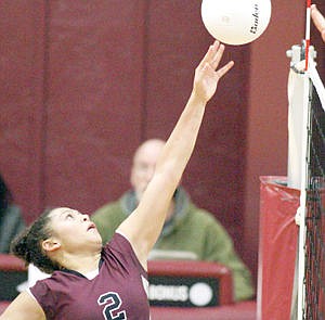 &lt;p&gt;Olivia Roach gently tips it over in first set vs. Plains during the District 7B Volleyball Tournament held at Troy's Activity Center Saturday.&lt;/p&gt;