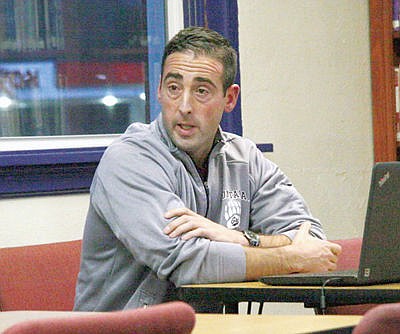 <p>Troy Public Schools Athletic Director Jeff Hawk leading the informational meeting on the possibility of Troy High School to change to a Class C school. (Bethany Rolfson/TWN)</p>