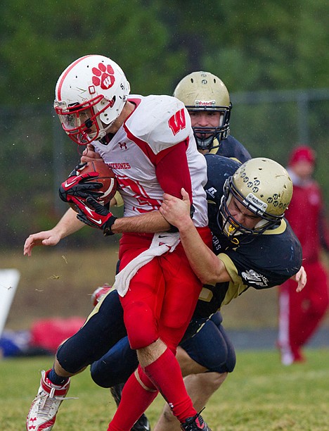 <p>Timberlake's Keegan Scott takes down Weiser's Justin Roberts in the backfield.</p>