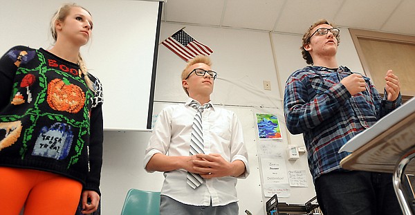 &lt;p&gt;Makenna Marvin, from left, Nick Brooks and Eli Brown of the Flathead Legislative Debate team practice the line game on Thursday, October 31, at Flathead High School. The exercise has one member begin a speech that is aburptly cut off and must be picked up mid-thought by the next person in line. (Brenda Ahearn/Daily Inter Lake)&lt;/p&gt;