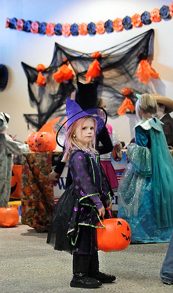 &lt;p&gt;Brooke Sharpe, 4, of Kalispell, takes in the sights at the Flathead Valley Community College Halloween Party on Tuesday, October 29, in Kalispell.&lt;/p&gt;