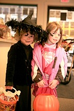 Kila Cannon and Alex Dupuis visit the Lake County Leader office during Polson city's Trick or Treat Friday.