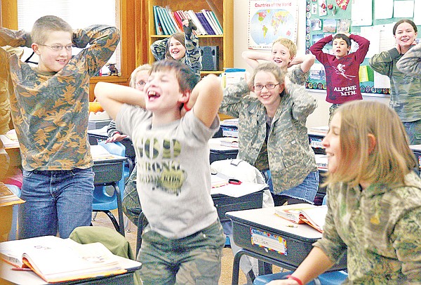 &lt;p&gt;Mr. Bill Moe&#146;s fifth-grade class performed boot-camp exercises
in their camouflage to fight drugs.&lt;/p&gt;