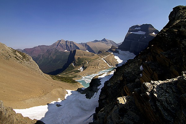 &lt;p&gt;Photos courtesy of Jake Bramante. I'm a huge fan of the Highline
Trail. A big reason for that is the amazing views. One of them that
you have to work for is the Grinnell Glacier Overlook. It's a spur
trail just before you get to Granite Park Chalet (if you're hiking
from Logan Pass) that is pretty unforgiving for about 3/4 of a
mile. When you get there, however, you look down on the almost mint
green waters of Upper Grinnell Lake which is that way because of
Grinnell Glacier that feeds directly into it, which is that big
chunk of snow/ice that you see just to the right of the lake in the
picture. This whole basin used to be Grinnell Glacier, but it's
receded to the point to where there is now a lake, Grinnell Glacier
and Salamander Glacier in the foreground. Either way, it is a
breathtaking view into the Many Glacier Valley with Angel Wing in
the middle of the shot, Mt. Gould towering above the glacier, the
red rocks of Mt. Allen and far off in the distance to the right is
Mt. Siyeh, one of the six over 10,000ft peaks in the Park. More
information of Bramante's project is available online at
www.hike734.com&lt;/p&gt;