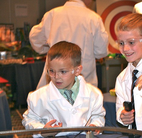 &lt;p&gt;A combination race car and train set captures the interest of Hayden Meadows student Alex Patterson, 6, and Isaac Putren, 8, a home-schooled student from Dalton Gardens. The boys are members of Figpickels Toy Emporium&Otilde;s all-kid, 12-member 2012 Board of Directors, which met Saturday at The Coeur d&Otilde;Alene Resort to test toys for the downtown retailer.&lt;/p&gt;