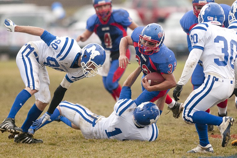 &lt;p&gt;Bigfork's Alex Ruiz (32) is taken down during Bigfork's loss to
Malta in the quartfinal game of the Class B Tournament Saturday
afternoon.&lt;/p&gt;