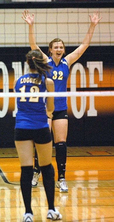 Libby senior Jackie Mee celebrates serving an ace against Flathead High School last month.