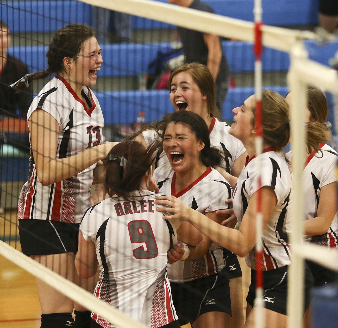 &lt;p&gt;The Arlee volleyball team celebrates after defeating Plains on Friday afternoon.&lt;/p&gt;