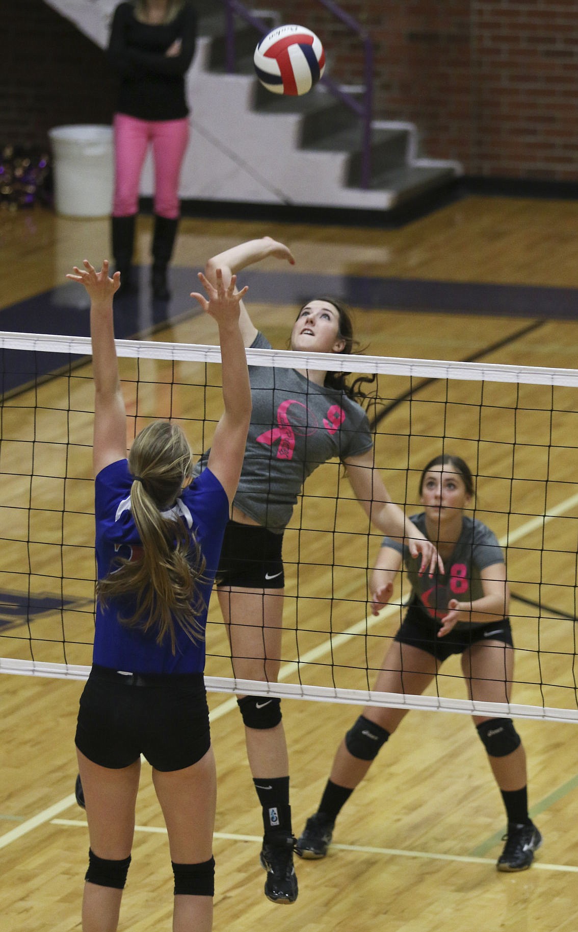 &lt;p&gt;Nichole Lake spikes the ball over a Columbia Falls defender on Thursday night in Polson.&lt;/p&gt;