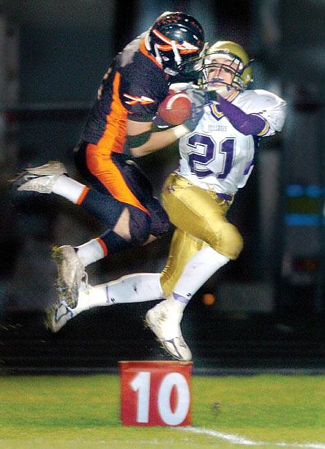 Flathead's Garrett Smith intercepts a pass intended for Butte's Brandon Penrose during the second half of Flathead's 28-14 Class AA playoff victory Friday night at Legends Stadium. Chris Jordan/Daily Inter Lake