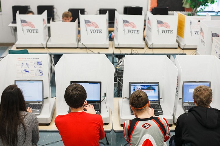 &lt;p&gt;Patrick Cote/Daily Inter Lake Students cast their votes during a mock election at Flathead High School on Wednesday morning. Wednesday, Oct. 31, 2012 in Kalispell, Montana.&lt;/p&gt;