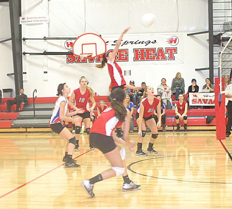 <p>Superior's Michele Smith returns the ball in Saturday's game against Hot Springs. The Lady Bobcats put up a strong match against the Lady Savage Heat.</p>