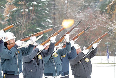<p>American Legion Post 97 honor guard with muzzle flash by William Swagger Jr.</p>