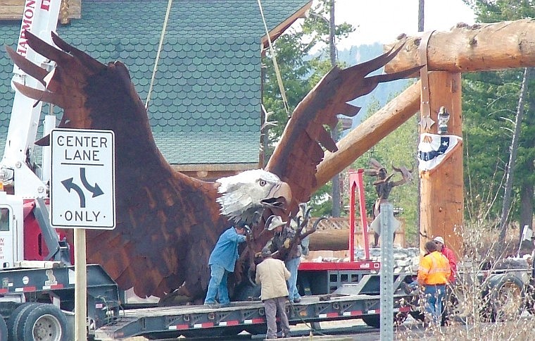 The 5,000-pound eagle was secured on a trailer and hauled away by Frontier Transportation.