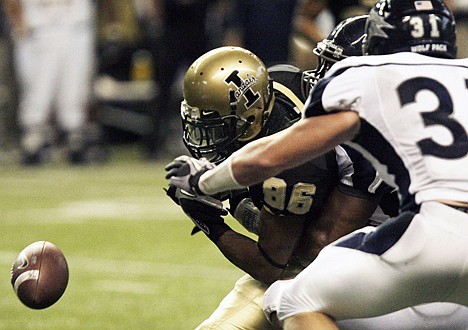 &lt;p&gt;Idaho receiver John Roberson (86) fumbles when hit by a Nevada defender as Nevada linebacker Kevin Grimes (31) watches during the third quarter Saturday in Moscow.&lt;/p&gt;