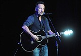 Springsteen auctions guitars, lasagna for veterans