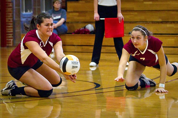 &lt;p&gt;North Idaho College's Tina Strahinic, left, goes for a dig as her teammate Esther Timofeyev leans in to assist during the first set against Salt Lake Community College in the Region 18 tournament championship match Saturday.&lt;/p&gt;