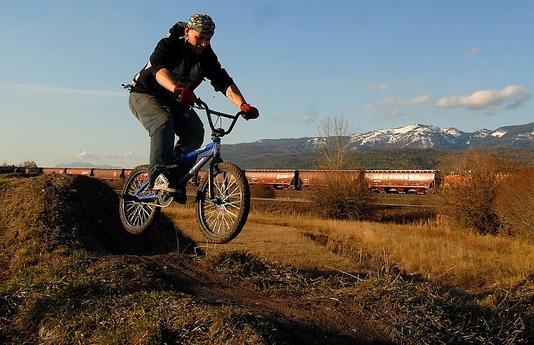 Douglas Smith catches a bit of air on his bike at the Whitefish Armory Park on Tuesday afternoon.