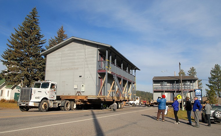 Two buildings from the Bayshore Motel move down U.S. 93 in Lakeside on Thursday morning. The buildings were being moved to the Youth With A Mission area. The motel property was bought by Margaret Davis and Bruce Ennis to make room for a public park to be developed by the two before turning it over to Flathead County.